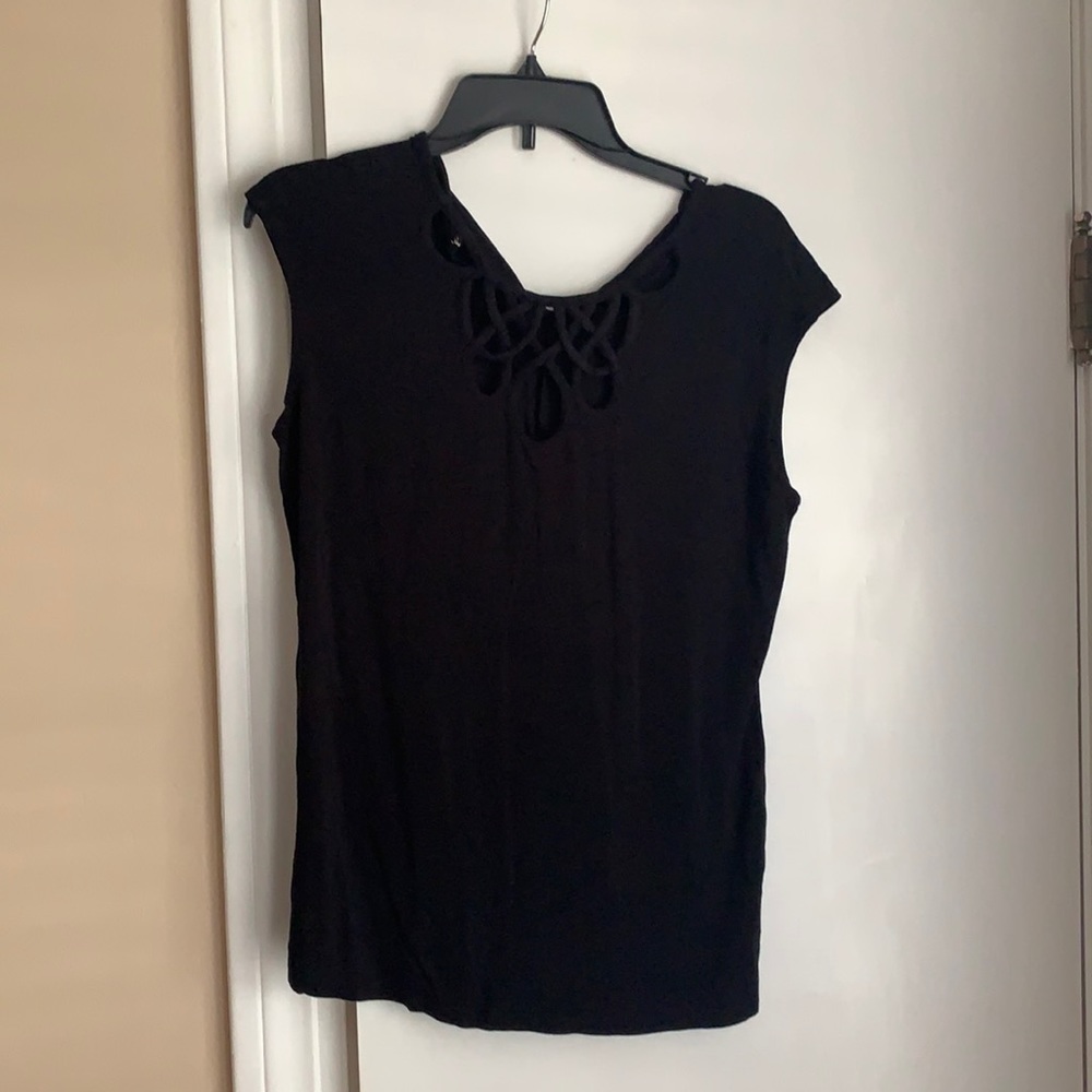 Black cap sleeve shirt.